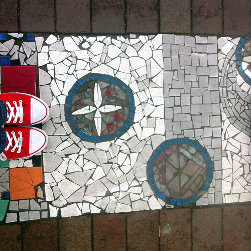 shoes on mosaic