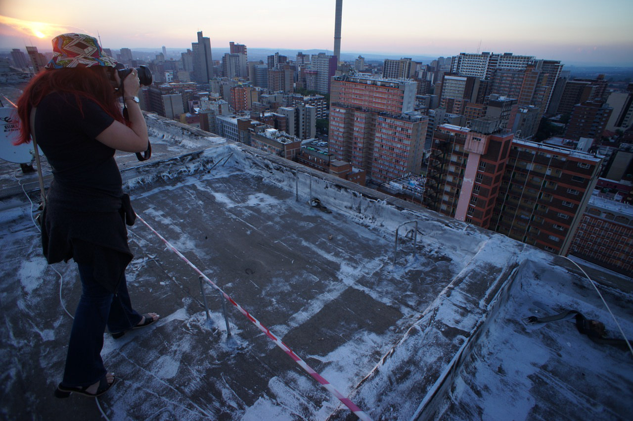 Heather photographs Hillbrow from the roof of the Tygerberg.