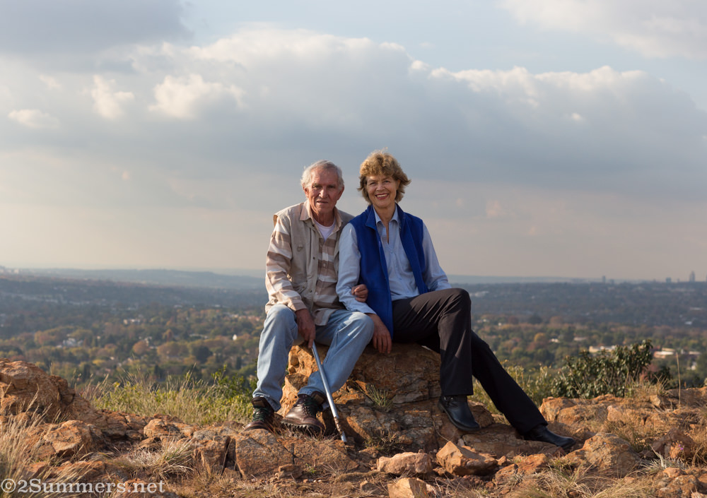 Wendy and David sitting on the Melville Koppies