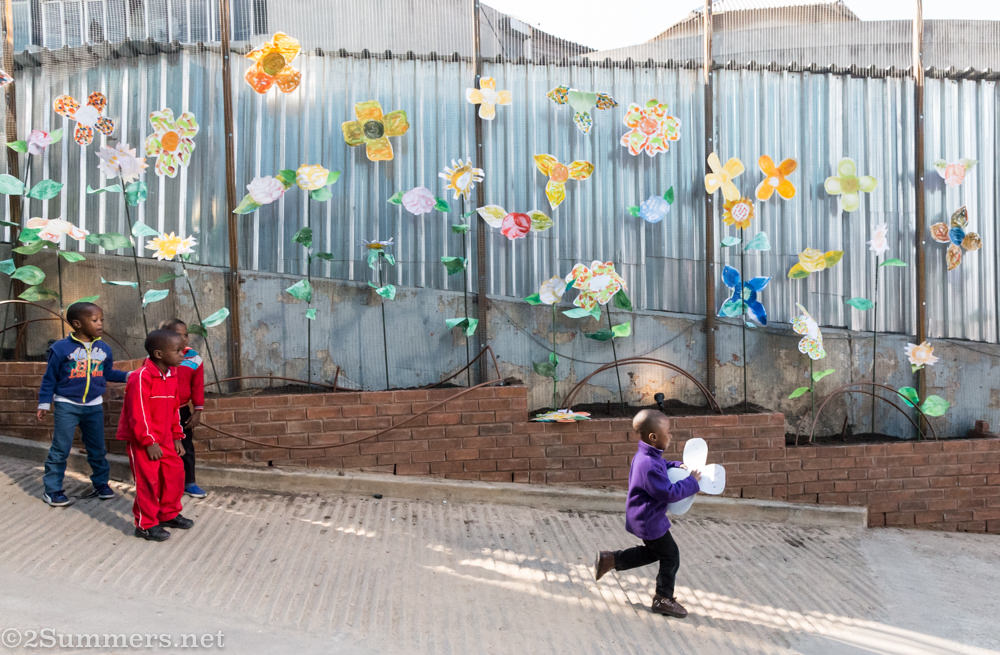 Cute kid running with flower