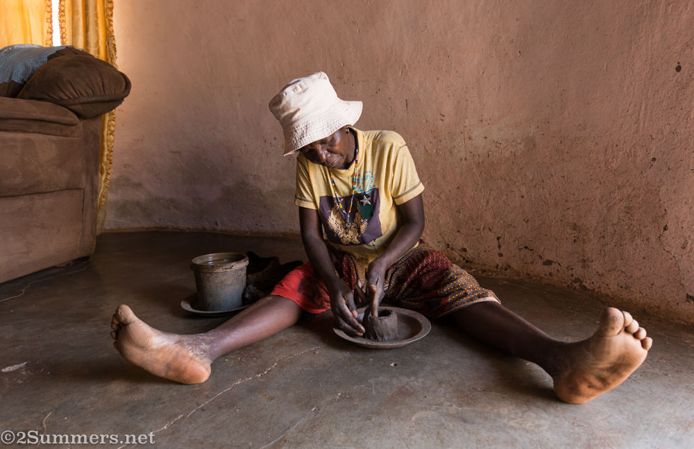 Esther making a pot