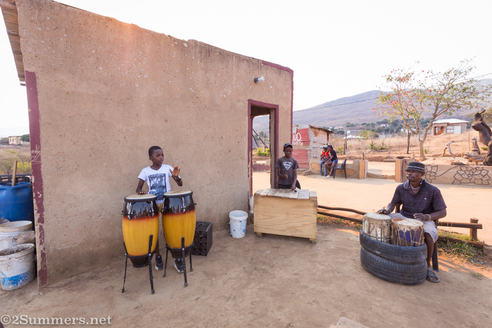 Kids playing music with Lucky Ntimani