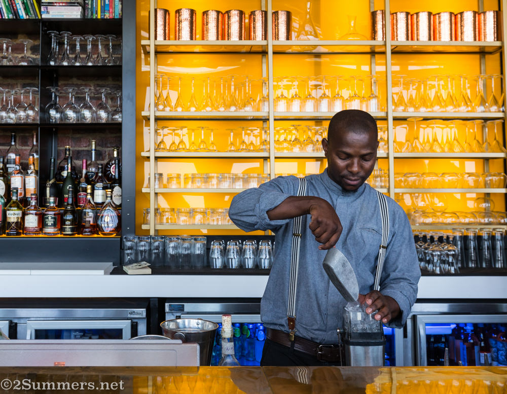 Bartender Thami making cocktails at Social Kitchen + Bar