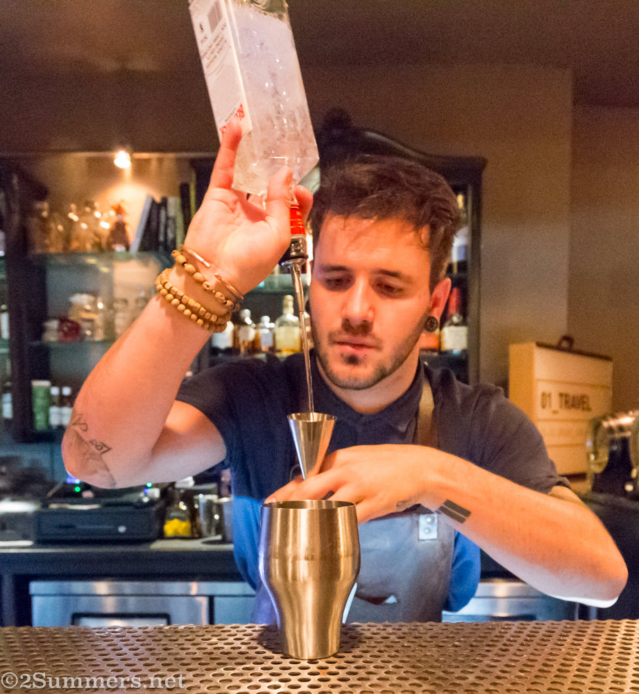 Julian Short mixes a cocktail