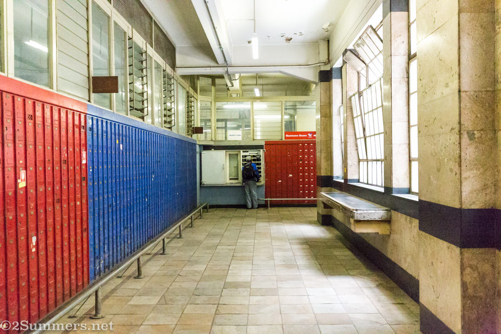 Person getting mail from a PO box