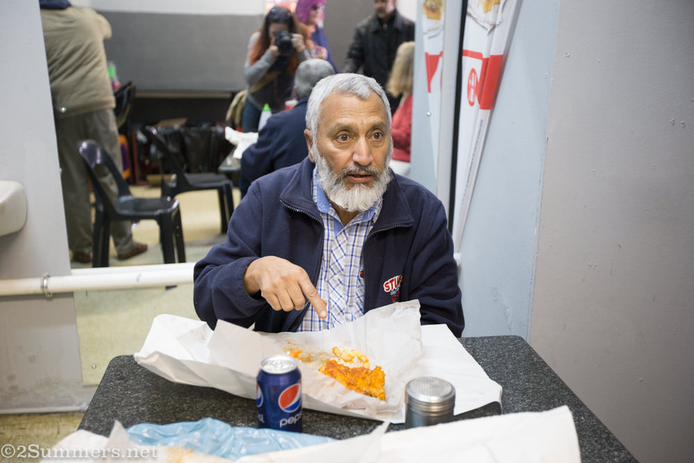 Man eating in Solly’s Corner
