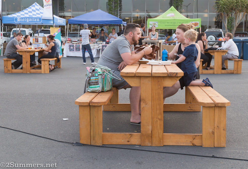 Family eating at Cedar Square Market