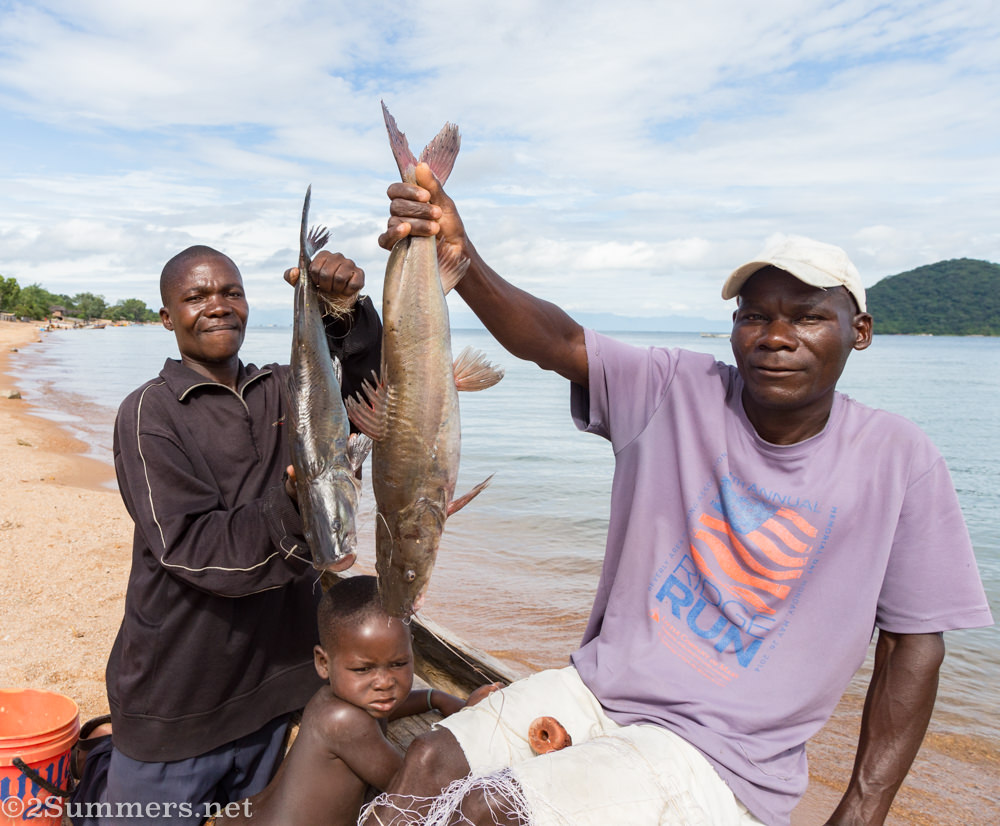 Men with fish on Lake Malawi