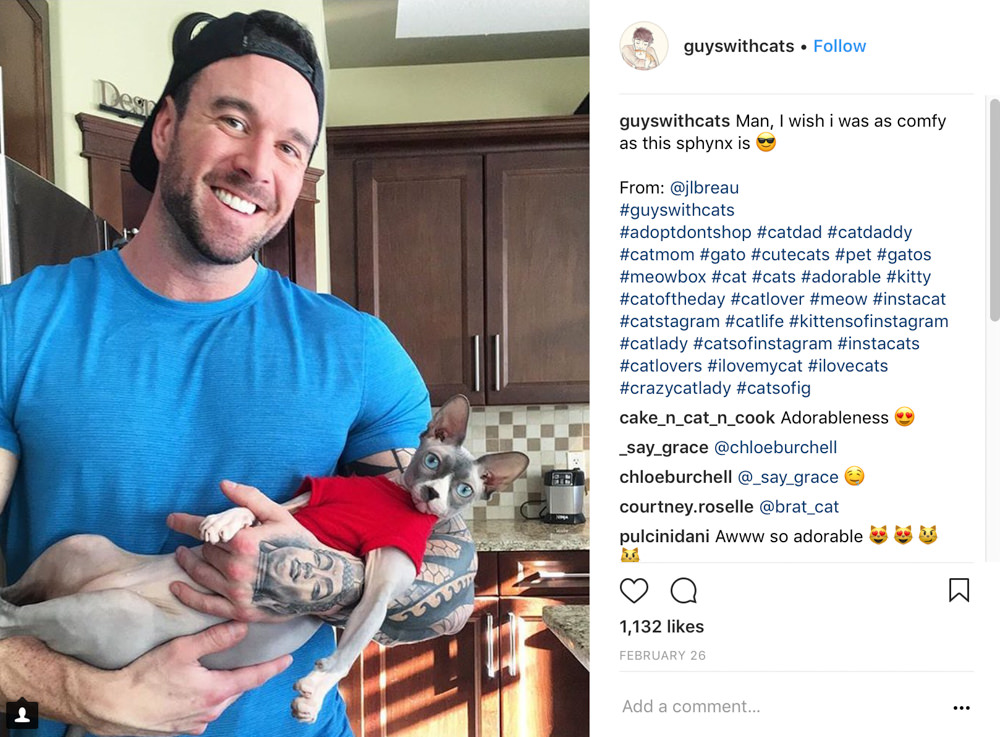 A guy with a hairless cat