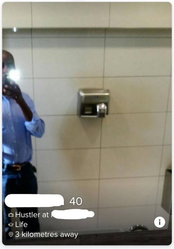 Tinder profile man in restroom