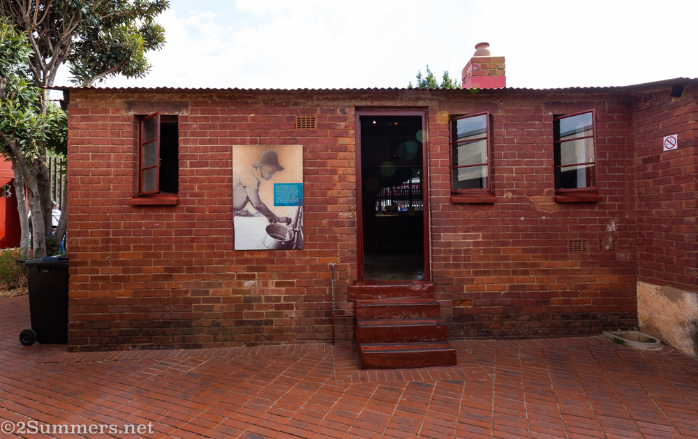 The outside of Mandela House, with photo of Winnie Mandela