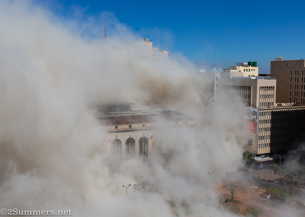 Johannesburg City Library engulfed in dust after the Bank of Lisbon Building imploded