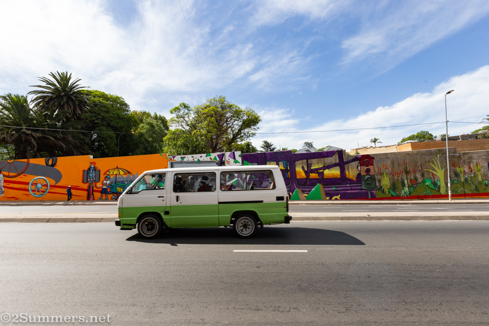 Taxi driving on Louis Botha past the S-bend mural