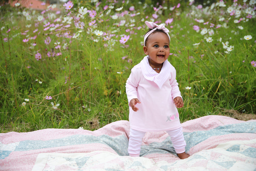 Baby in Little Lumps clothing