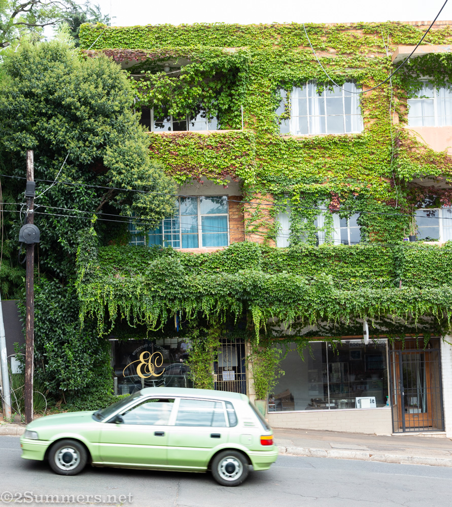 Green building and green car in Melville
