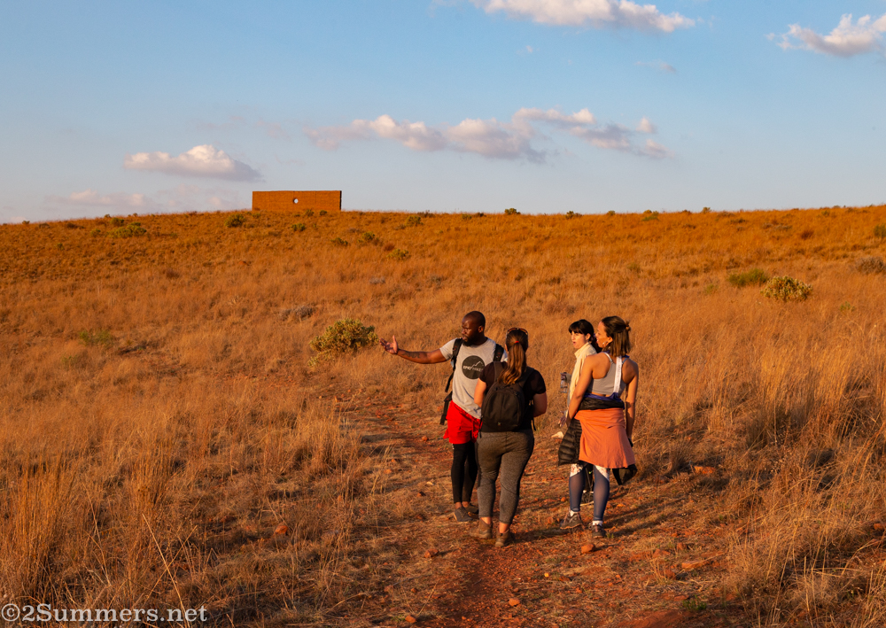 Lesego from Epic Hikes shows us the sculpture at the top of the hill