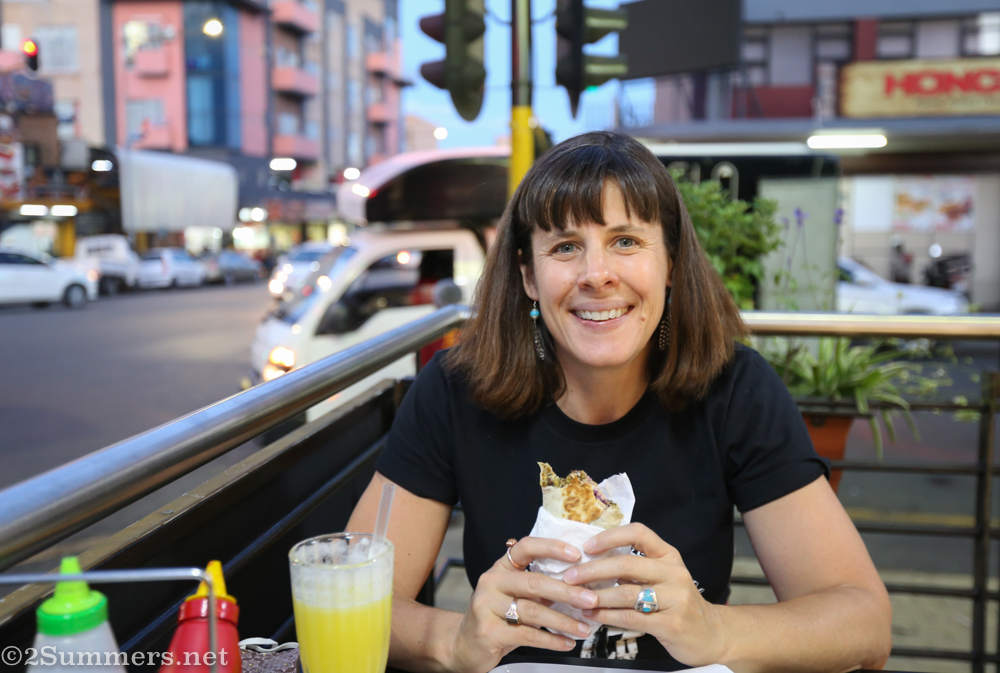 Heather eating her wrap at Syrian Rose