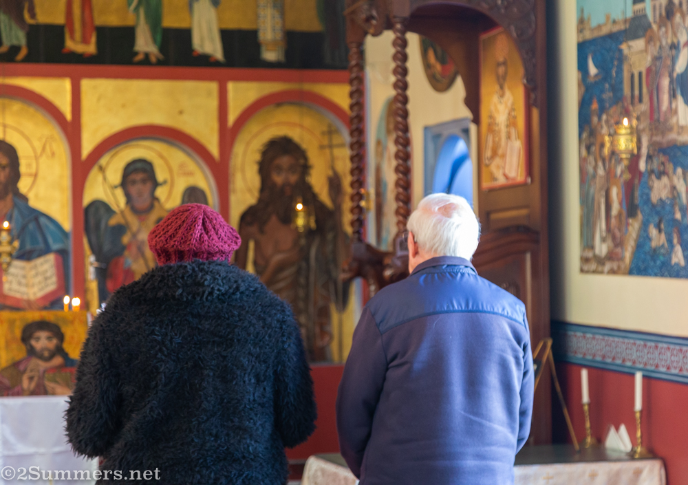 People praying in St. Nicholas