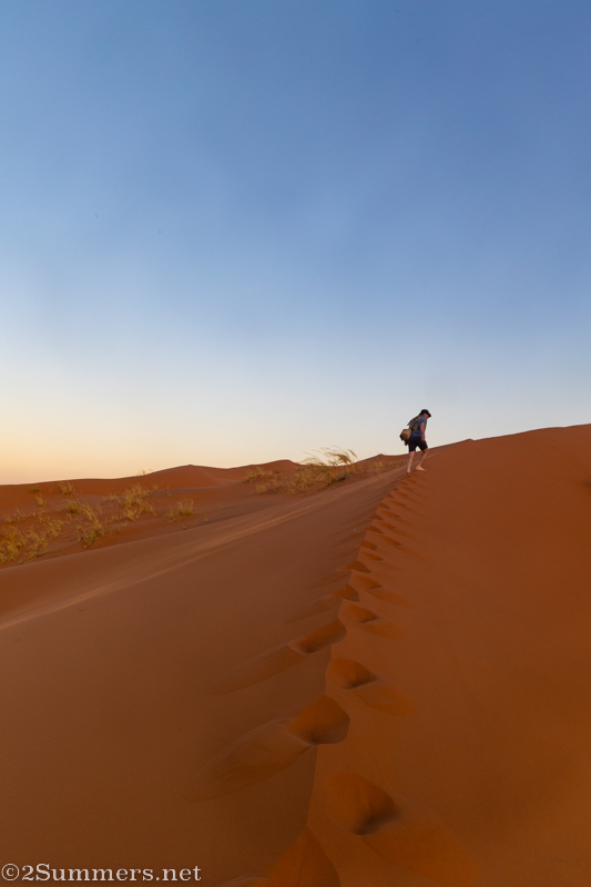 Thorsten climbing a steep dune